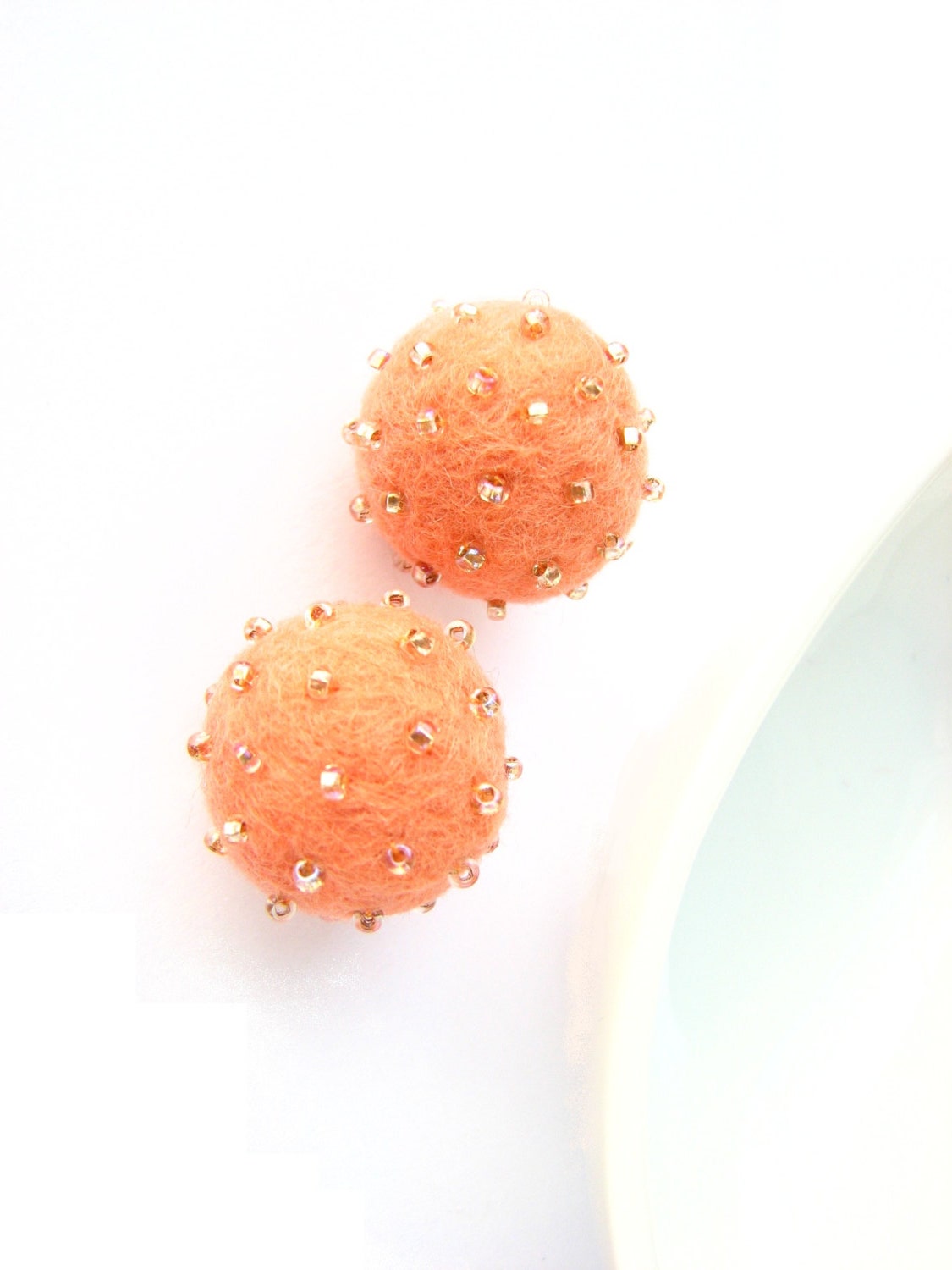 Set of 2 peach felted round wool beads decorated with seed beads