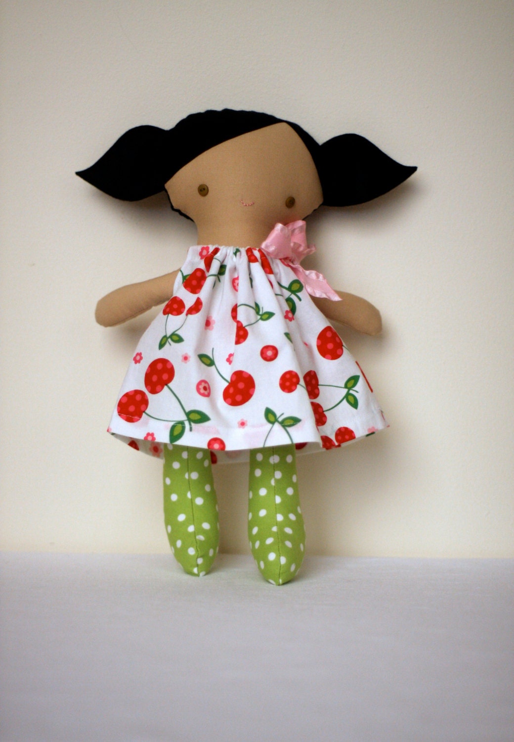 Coco doll- black hair, hazel eyes