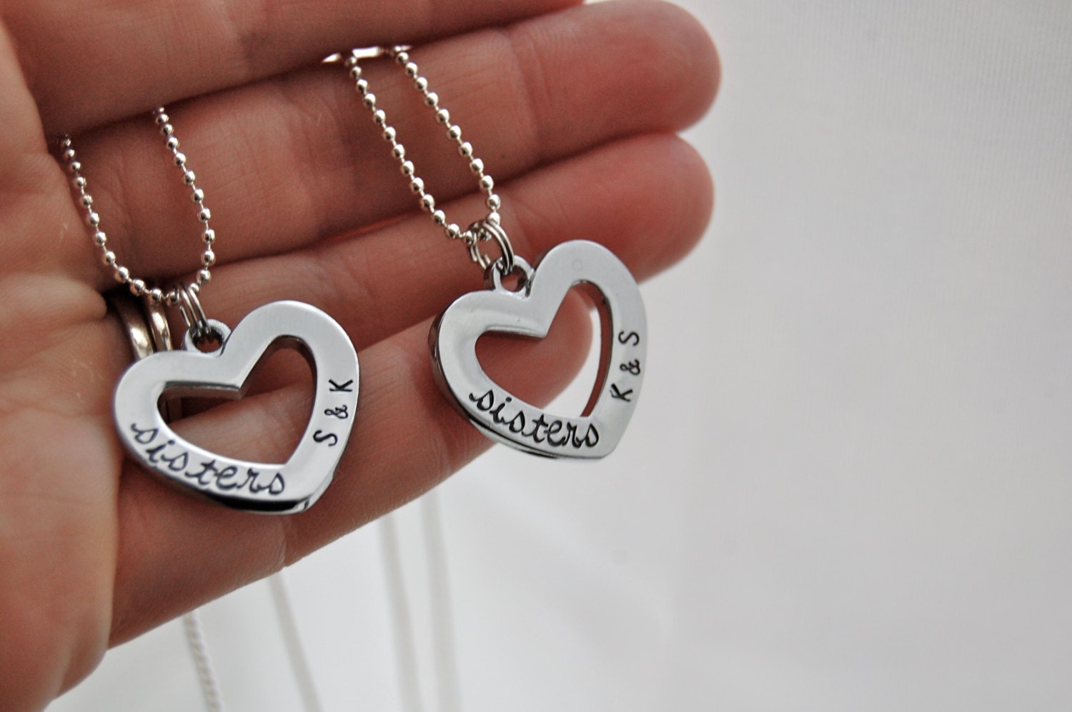 Sisters Necklaces. Personalized. Hand Stamped Heart Washers.