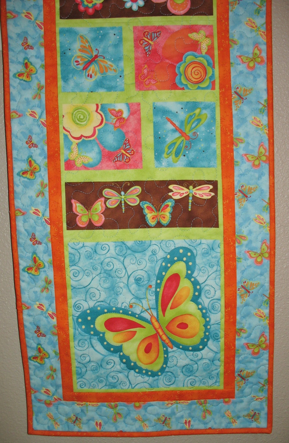 Butterfly Wall Hanging or Table Runner quilted with fabric from Wilmington Prints