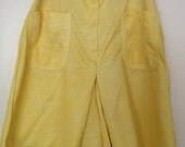 Pale yellow skort, tennis skirt, A-line skirt with shorts underneath, women's small