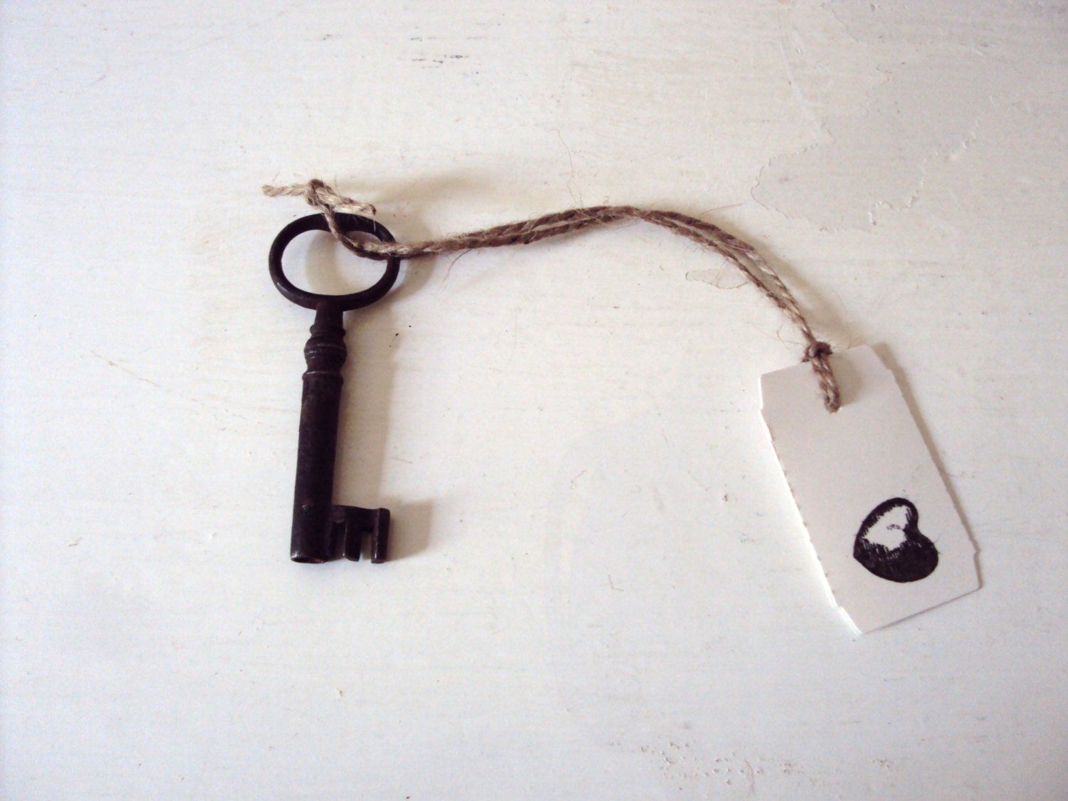 VINTAGE key. Antique key with luggage tag and string