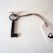 VINTAGE key. Antique key with luggage tag and string