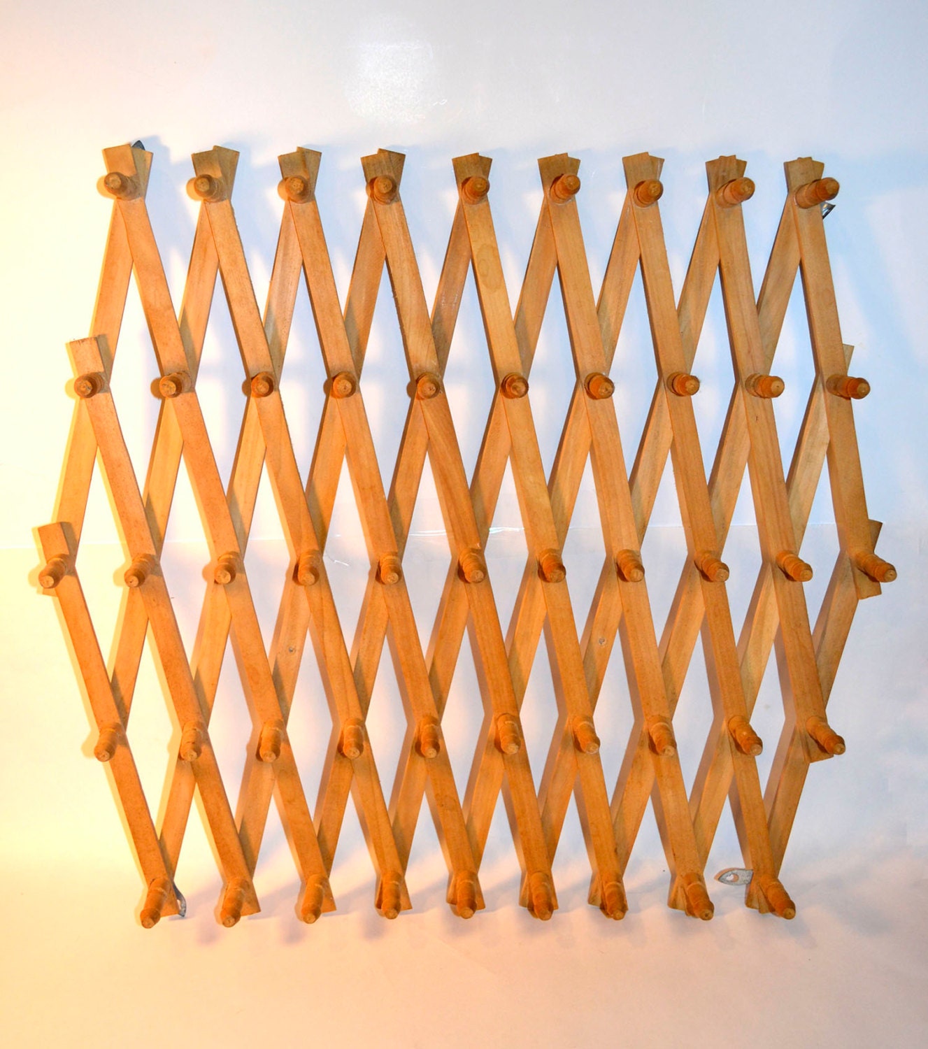 The Ultimate Peg Rack Wooden Accordion Peg Wall by BananasDesign