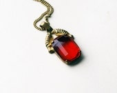 vintage red glass and gold plated pendant on golden brass chain