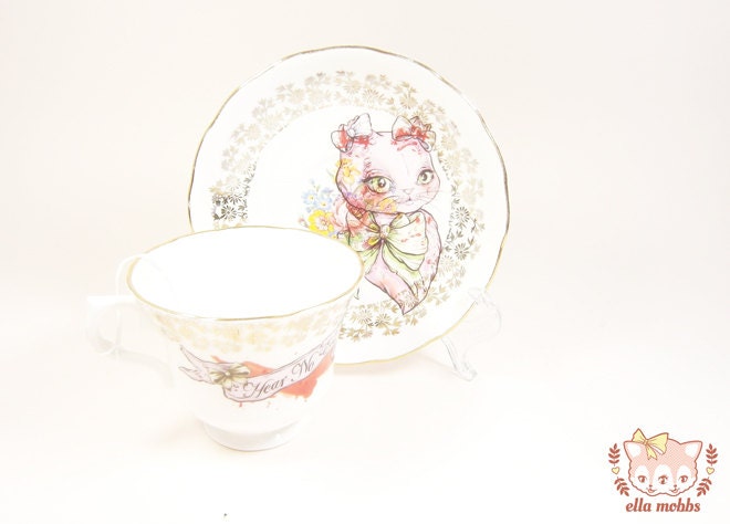 Vintage Tea Cup and Saucer with a "Hear No Evil" Cat Illustration