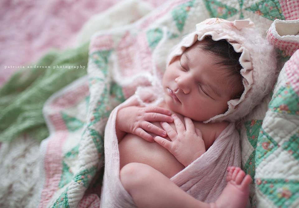 Newborn Pink Ruffle Bonnet with Bow.