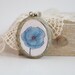 Oval Antique Bronze Locket Necklace - Epoxy Glass - Meconopsis Betonicifolia