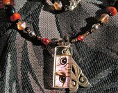 Pink Cat Necklace. Cat eye pendant and abstract  pendant.  Red and black beads. Chunky necklace. Cat jewellery.