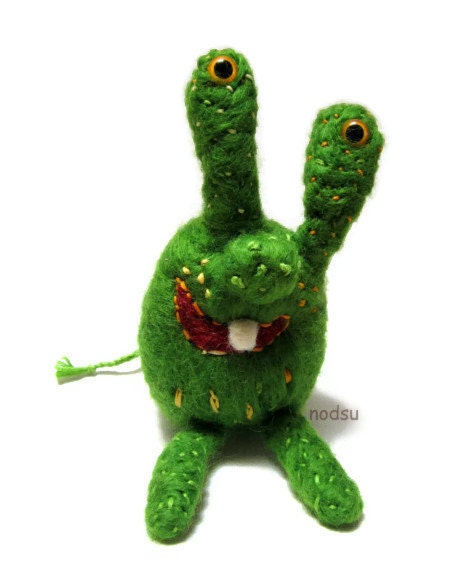 Green alien toy needle felted with one tooth and bendy legs embroidered stitched OOAK