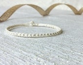 tiny faceted silver beads dainty layering wrap bracelet. max.