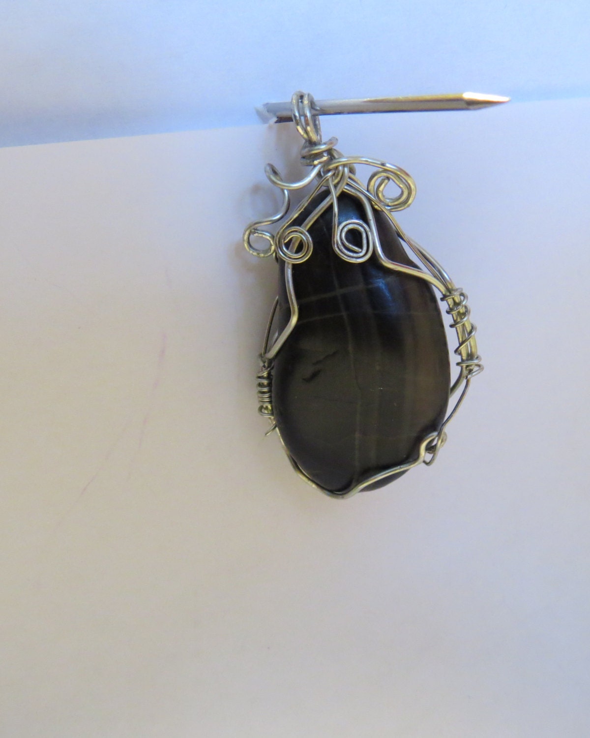 Natural river Stone Pendant hand wirewrapped in silver tone wire unique shape stone
