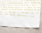 verses in mustard on white handprinted fabric panel blue green teal