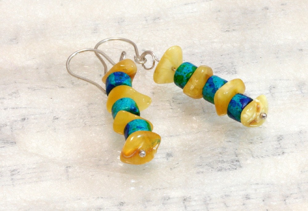 Earrings of butterscotch amber and green ceramic beads