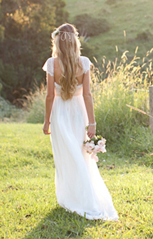 Beautiful low back wedding dress with lace capped sleeves and dreamy silk chiffon skirt, fitted to the waist