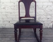 Dark Wood Children's Rocker with Black Leather Upholstery