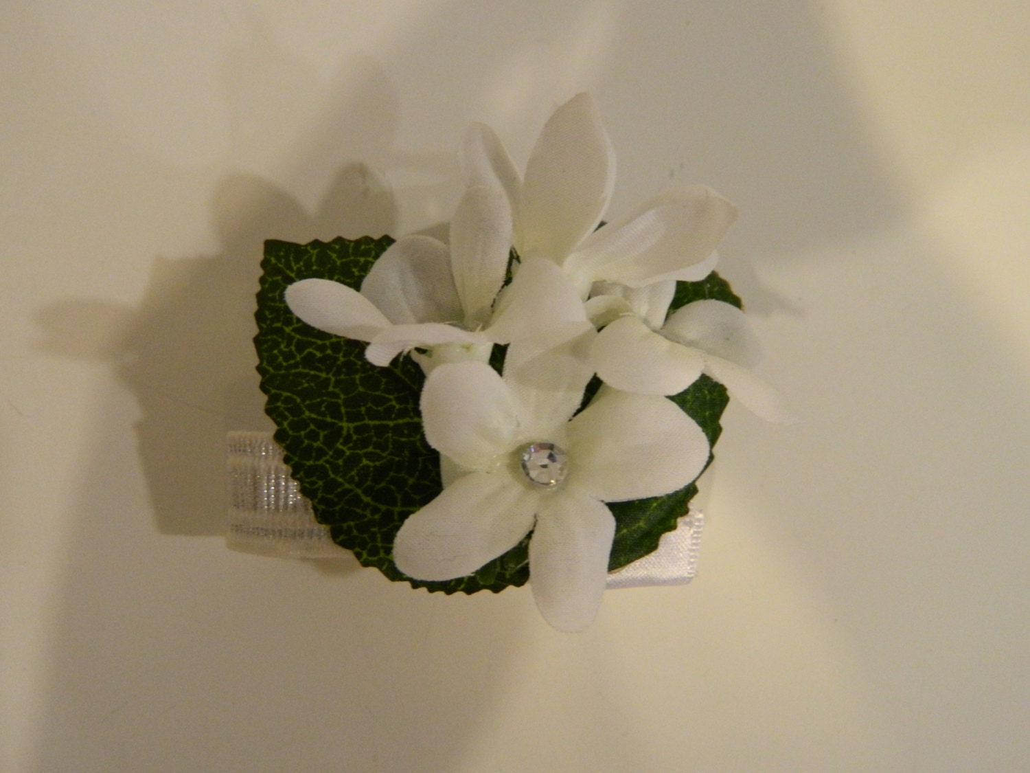 White corsage, Stephanotis, rhinestone, green, wrist corsage, prom corsage, wristlet, artificial flowers, silk flowers