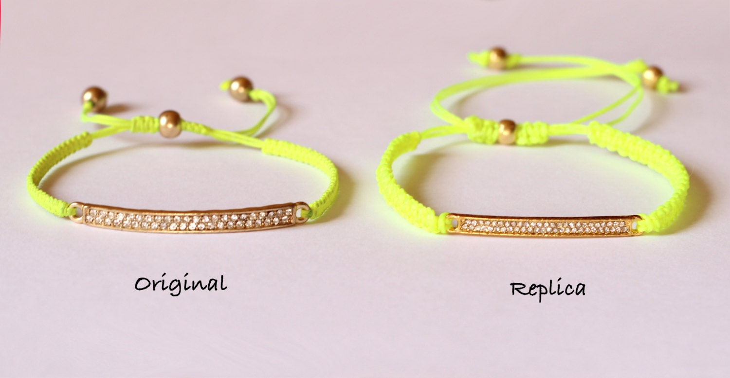 Kristen Stewart neon yellow rhinestone bar ID bracelet pave