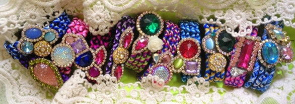 Melange hand-woven friendship bracelets embellished with aurora borealis and zircon crystals, resin and glass cabochons