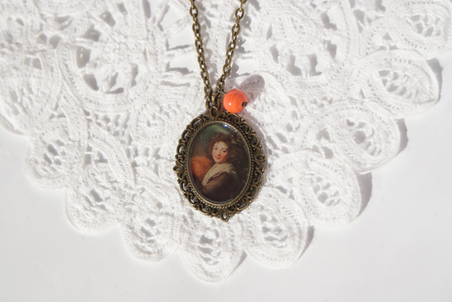 Unique long brass necklace with handmade amulet, image of eighteenth century portrait with vintage coral bead