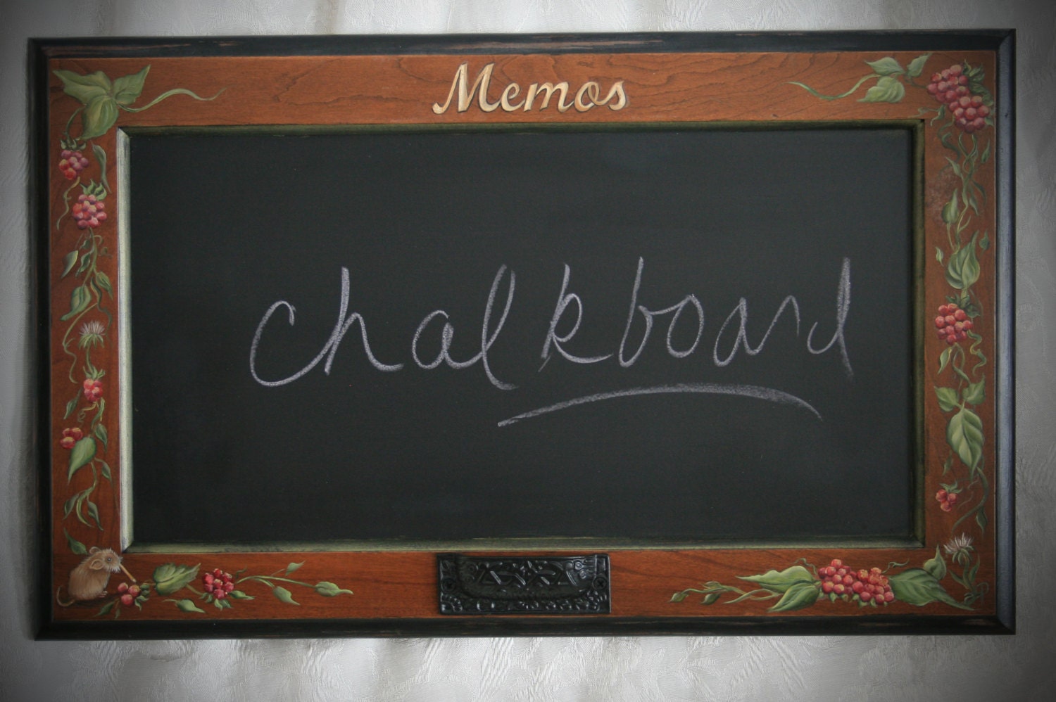Chalkboard made on repurposed cabinet door. Hand painted with mouse in corner, and a chalk holder.