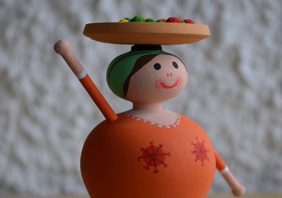 Small wooden dolls handmade colorful orange traditional portuguese figurine folk art for rustic home decor ornament . rf.011