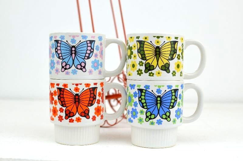 Vintage Stackable Butterfly Coffee Mugs and Retro Wheel Barrel Carrier: Set of Four