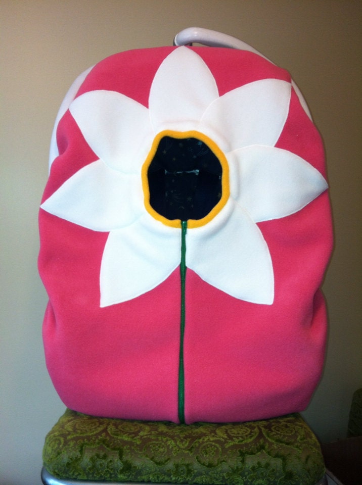 Daisy Infant Baby Car Seat Cover on salmon-coral background......