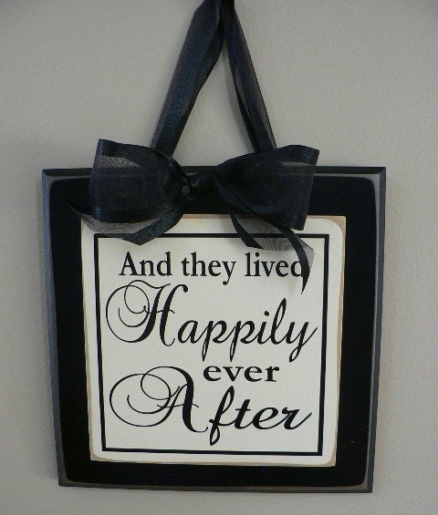 And They Lived Happily Ever After Saying On Wood Sign With