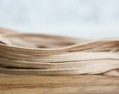 Beige Skinny Elastic - 1/8 inch Taupe Skinny Elastic - CuteZCrafts Beige Skinny Elastic - 1/8 inch Taupe Skinny Elastic - CuteZCrafts