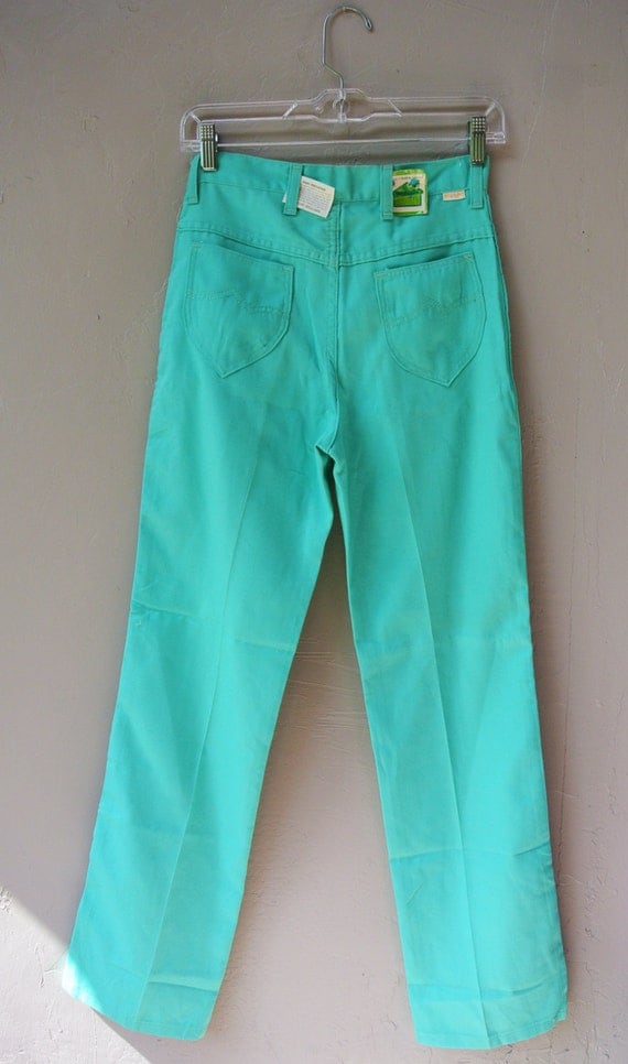 Items similar to vintage high waist Girls jeans / turquoise colored