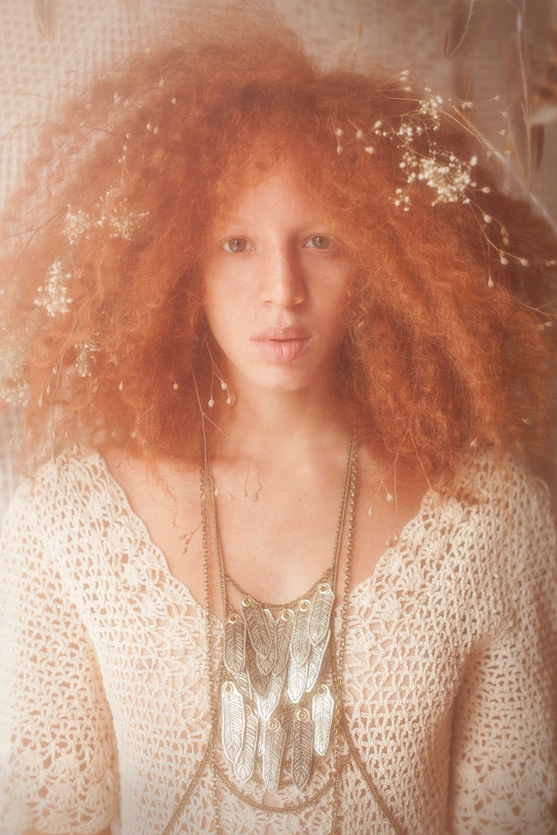 Golden leather screen-printed feathers body jewellery statement piece