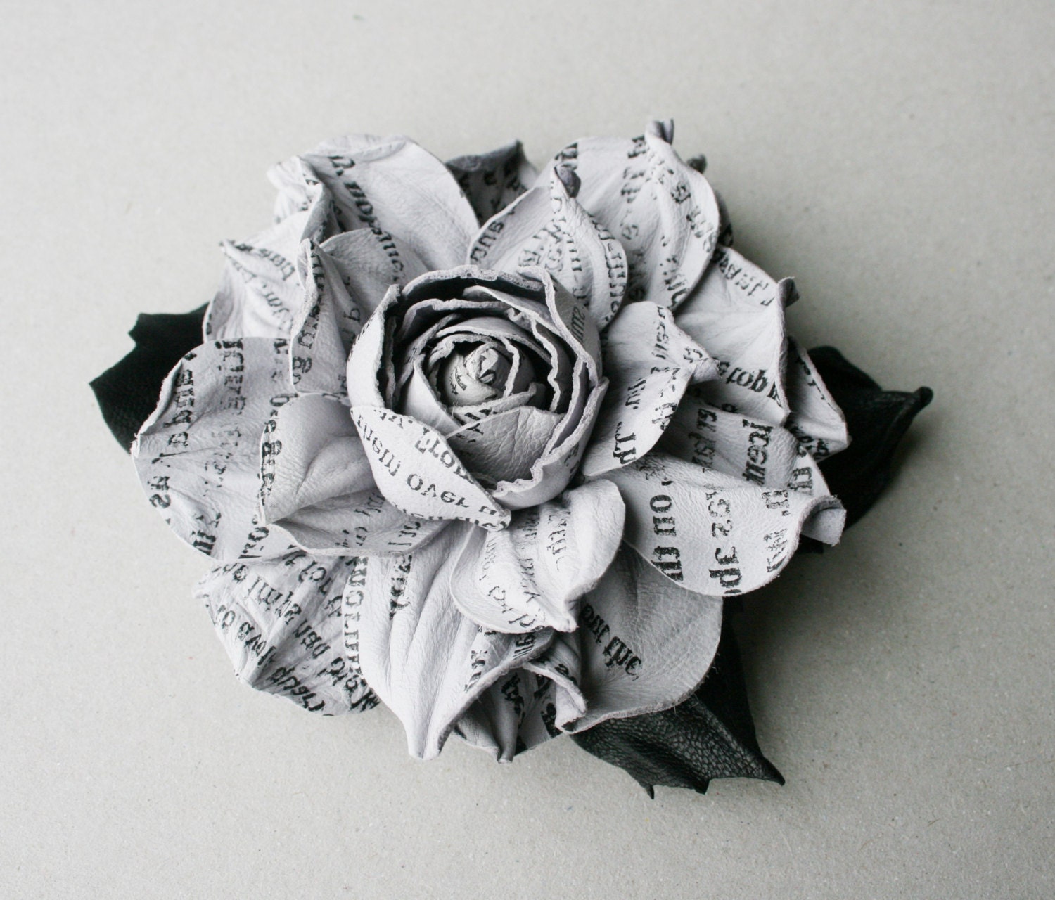 Newspaper style grey leather rose flower brooch / hair clip