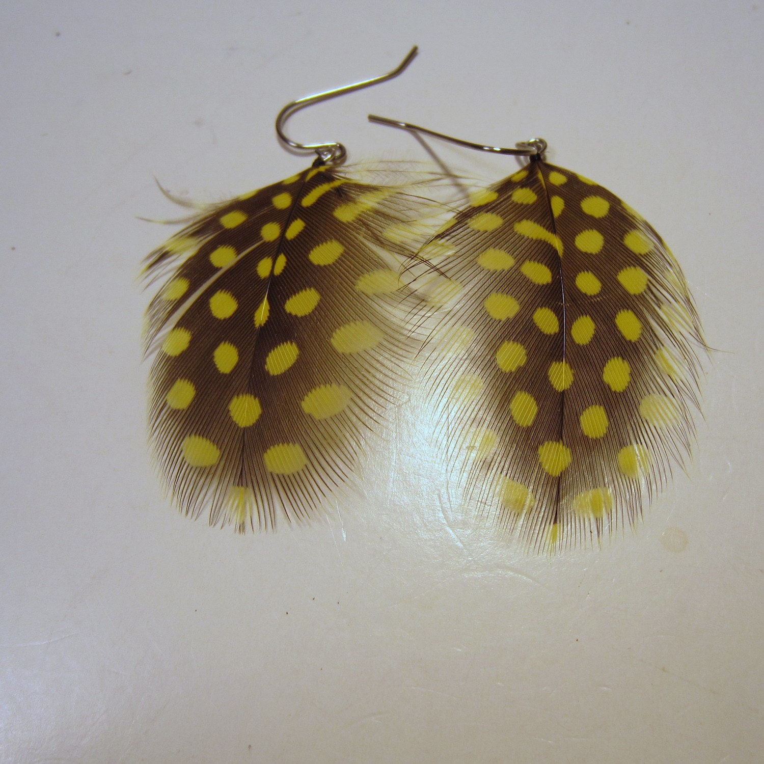 Yellow polka dot Feather Earrings