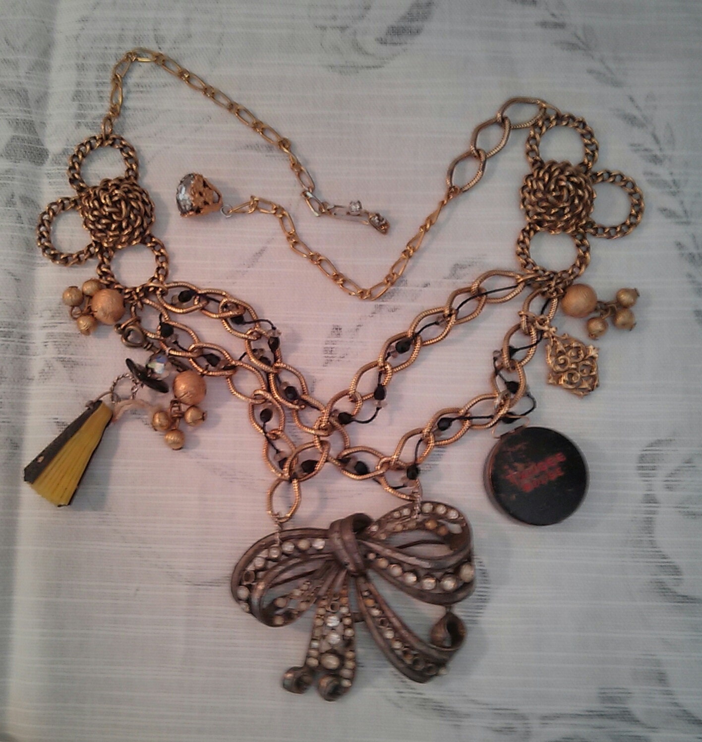 my french story Harlotta assemblage necklace vintage cosmetics fan the key to courting vintage charms rhinestones