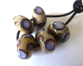 handmade lampwork glass beads, purple spots
