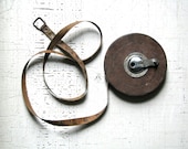 vintage metal measuring tape