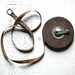 vintage metal measuring tape