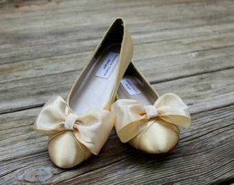 yellow flats with bow