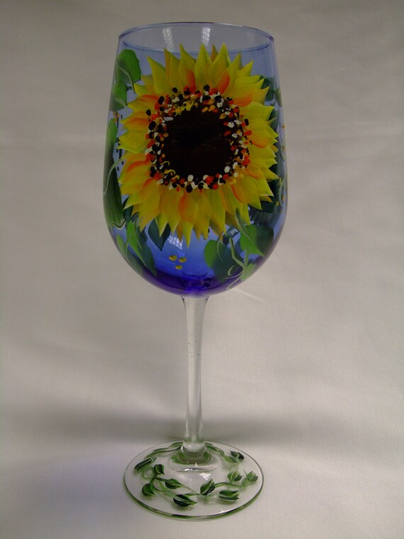 Hand painted wine glass in sunflower design by 800ChestnutStreet