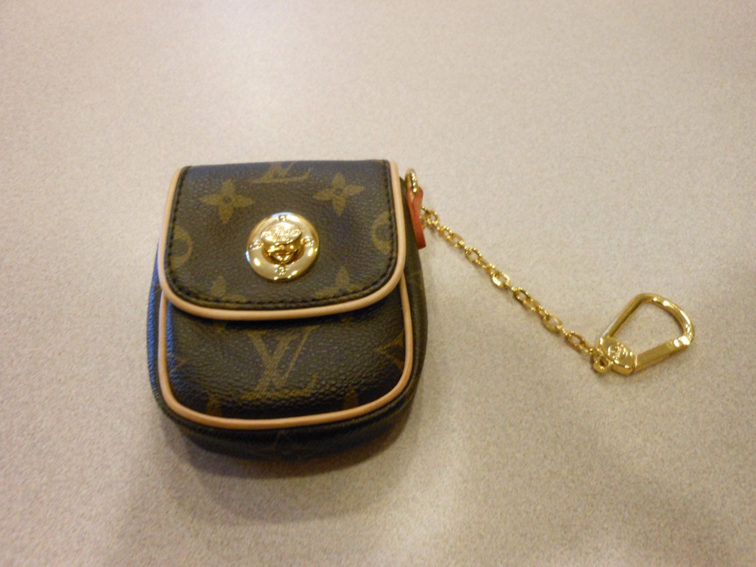 Items similar to Louis Vuitton Tulm Coin Purse Key Chain Turn lock Monogram on Etsy