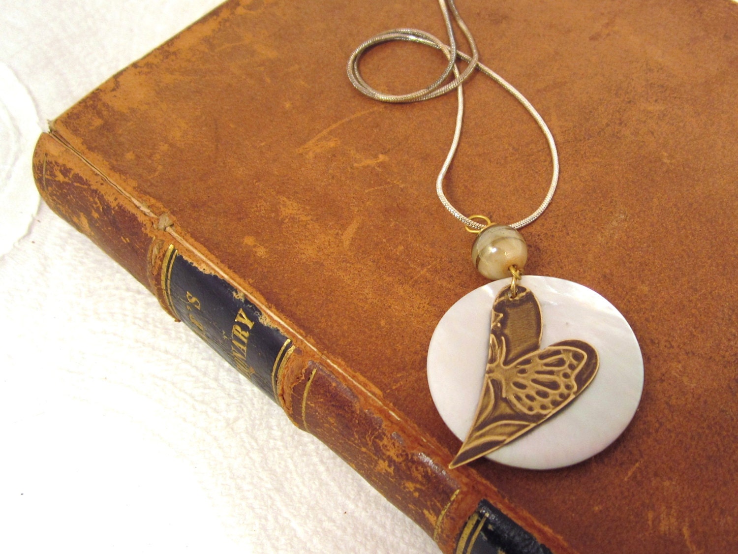 fall fashion trends -- Simple hand-embossed heart with shell focal pendant necklace