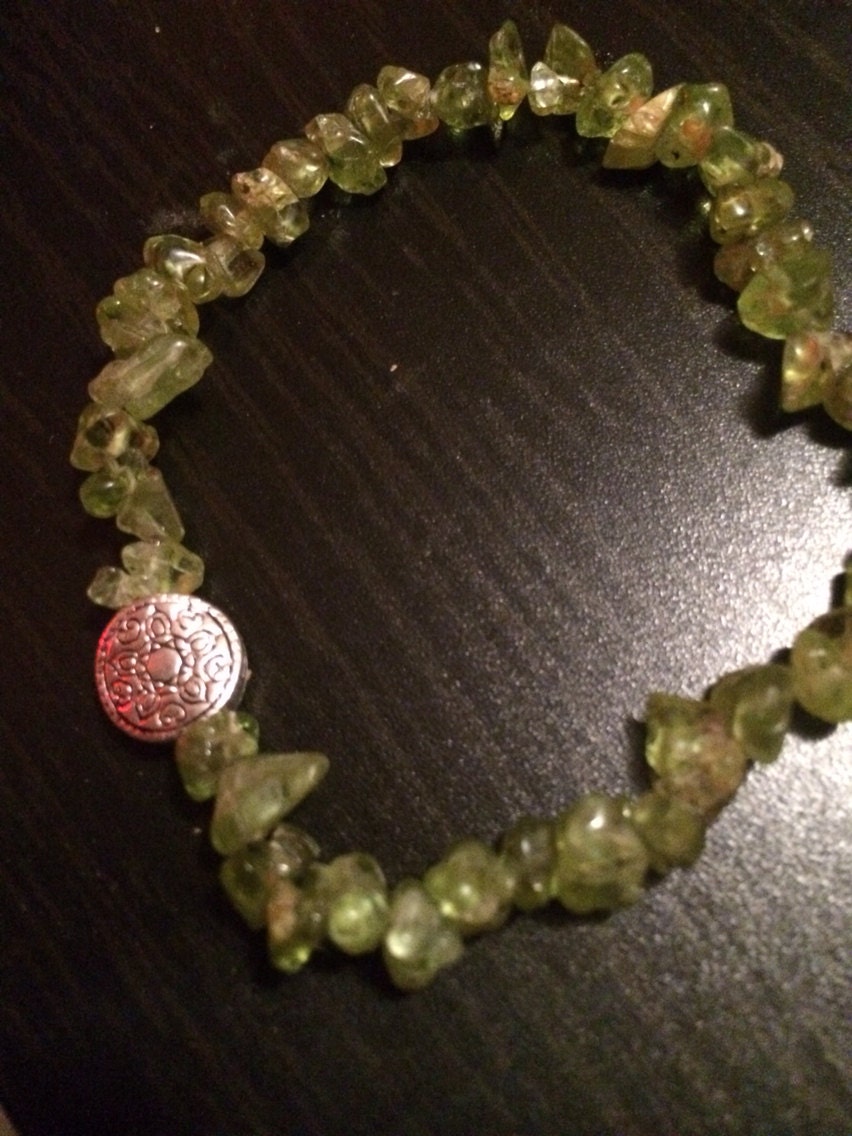 Peridot chipped stone hand beaded bracelet with accent charm
