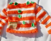 Smiling Shamrock Baby Cardigan - handknitted orange white and green sweater for toddlers with applications and a stripy pocket - koticzka
