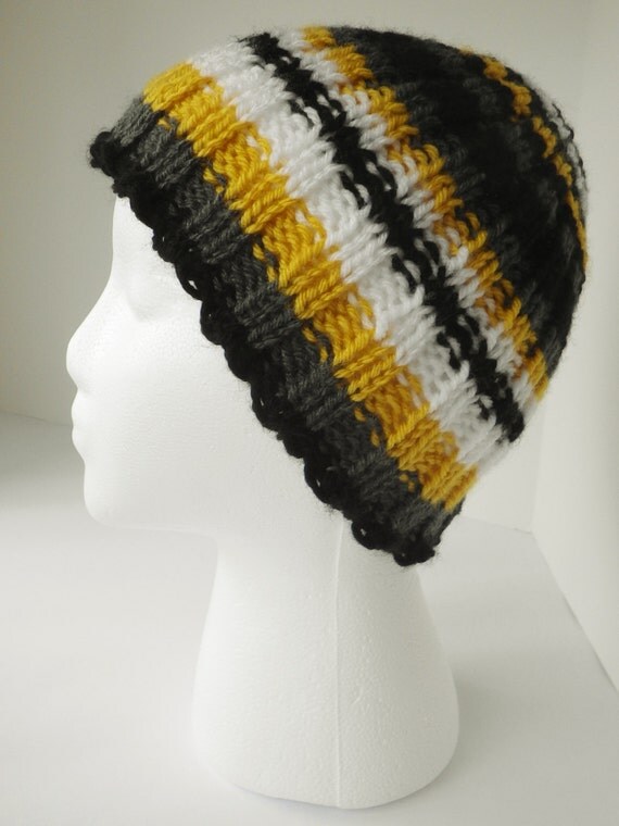 Items similar to Hand knit toboggan, multicolored hat, black and white