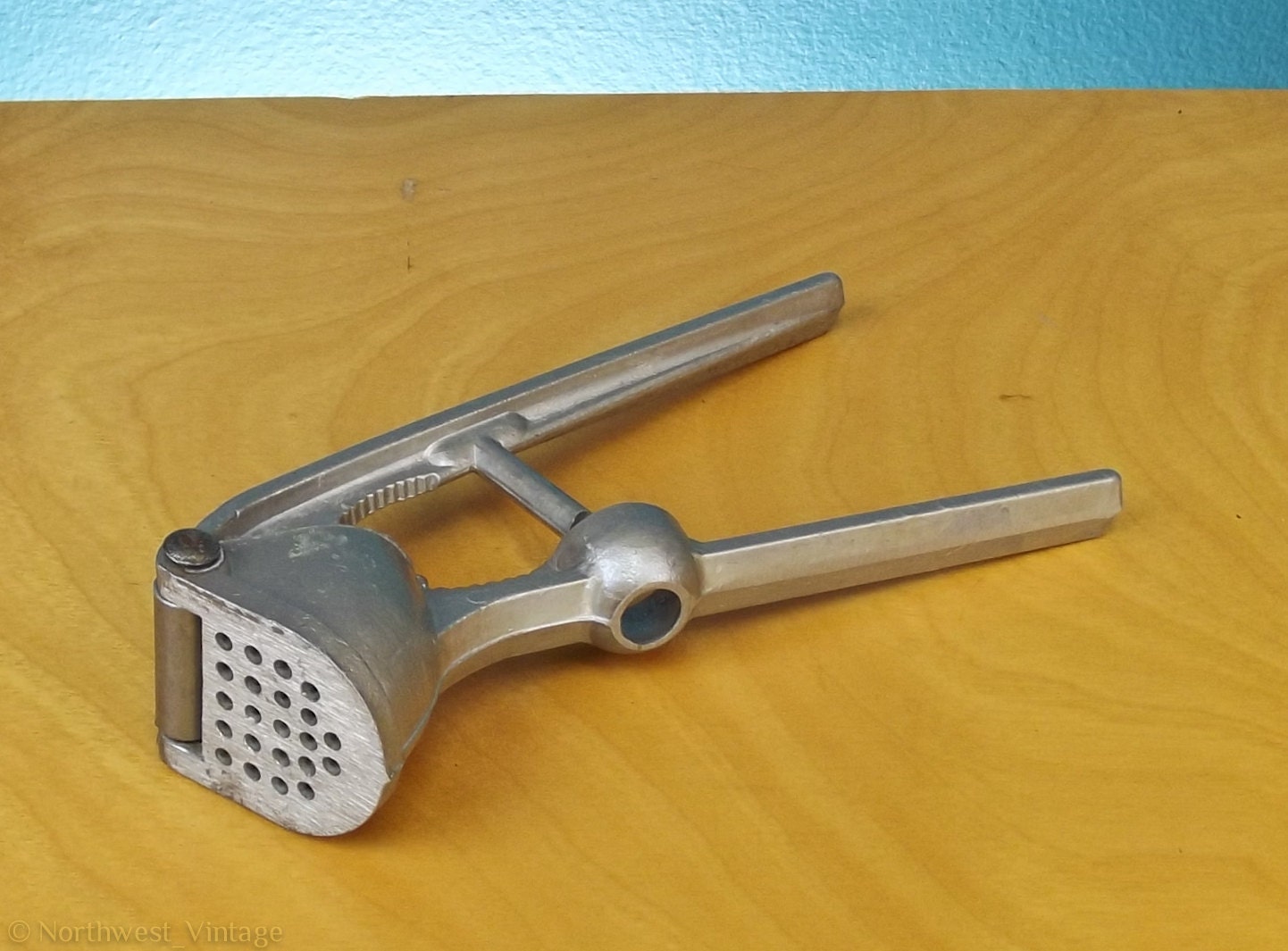 Items similar to Vintage Aluminum Garlic Press, Olive Pitter, and