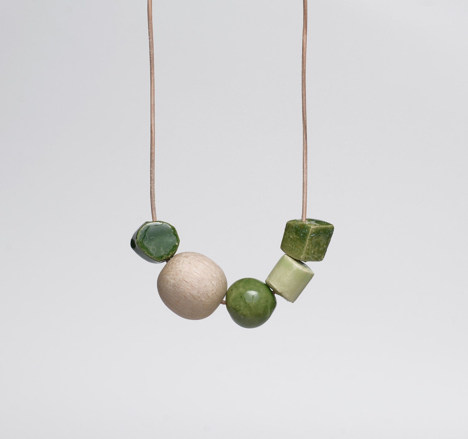 Emerald Green Ceramic Necklace With a Wooden Bead Modern Mixed Media Jewellery Moss Green - terrafique Emerald Green Ceramic Necklace With a Wooden Bead Modern Mixed Media Jewellery Moss Green - terrafique