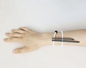 minimal tribal bracelet with black sticks and white beads - contemporary jewelry - pergamondo