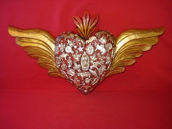 Items similar to Wood Carved Sacred Heart With Milagros Sacred Flaming