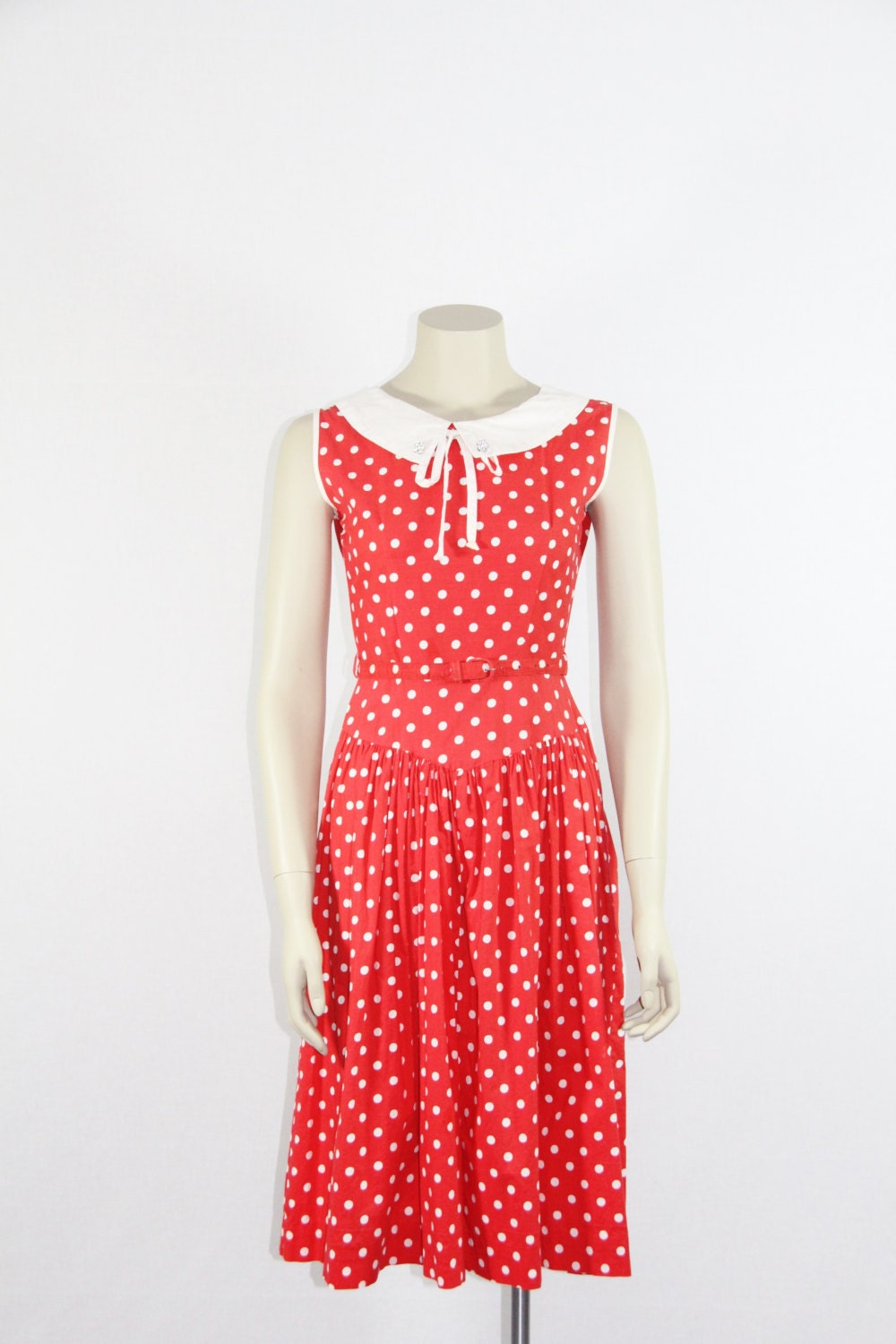 red frock with white dots